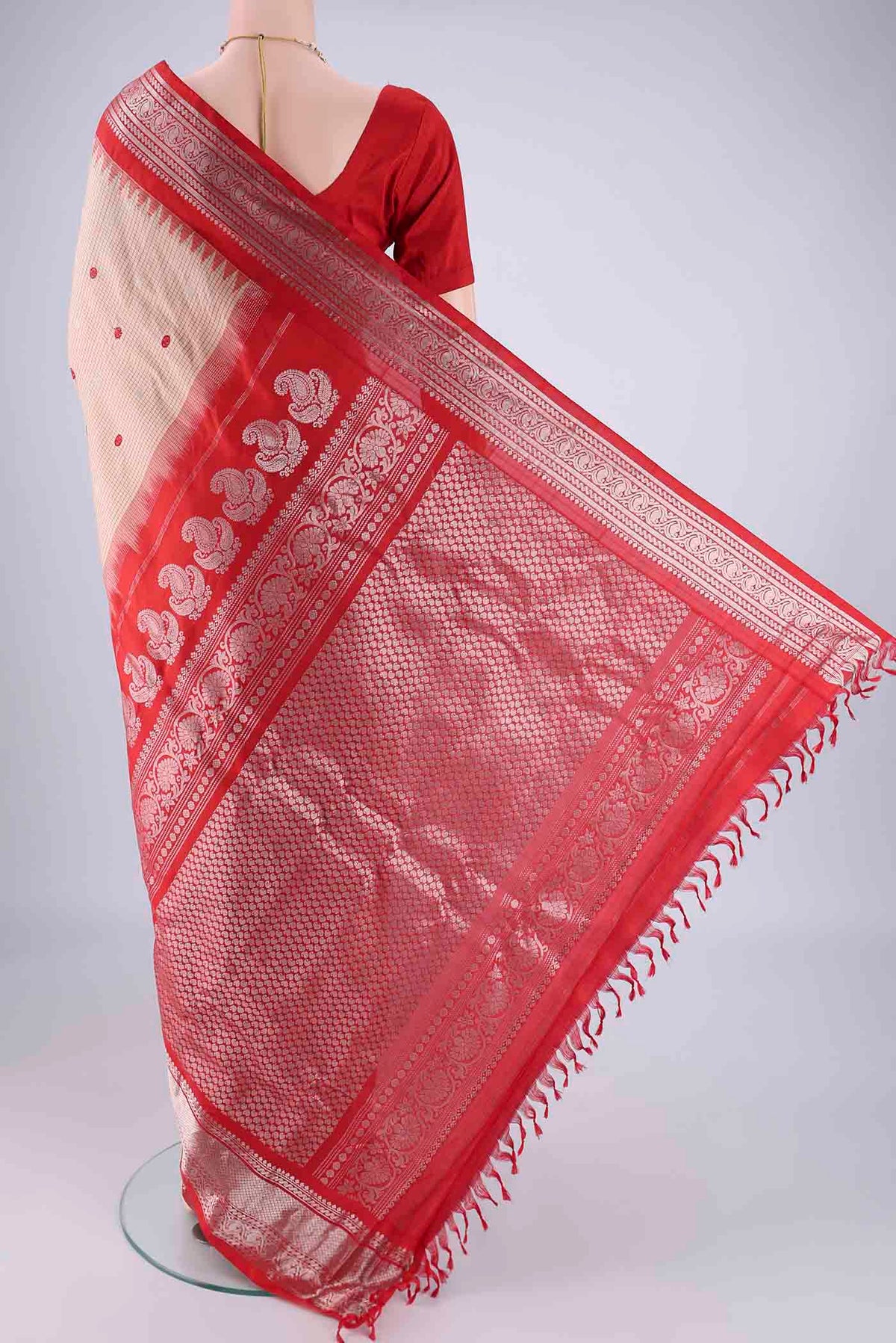 Flat view of Beige Gadwal Silk Saree with Checked design on the body and Zari Border. 