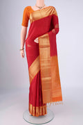 Maroon Soft Silk Saree with Zari Butta on the body and Zari Border.  displayed on a mannequin