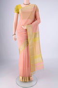 Peach Dual Tone Maheshwari Silk Cotton Saree with Plain Body and Thread Border.  displayed on a mannequin