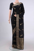 Black Mysore Crepe Saree with Zari Butta on the body and Zari Border.  displayed on a mannequin