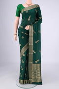 Bottle Green Mysore Crepe Saree with Plain Body and Zari Border.  displayed on a mannequin