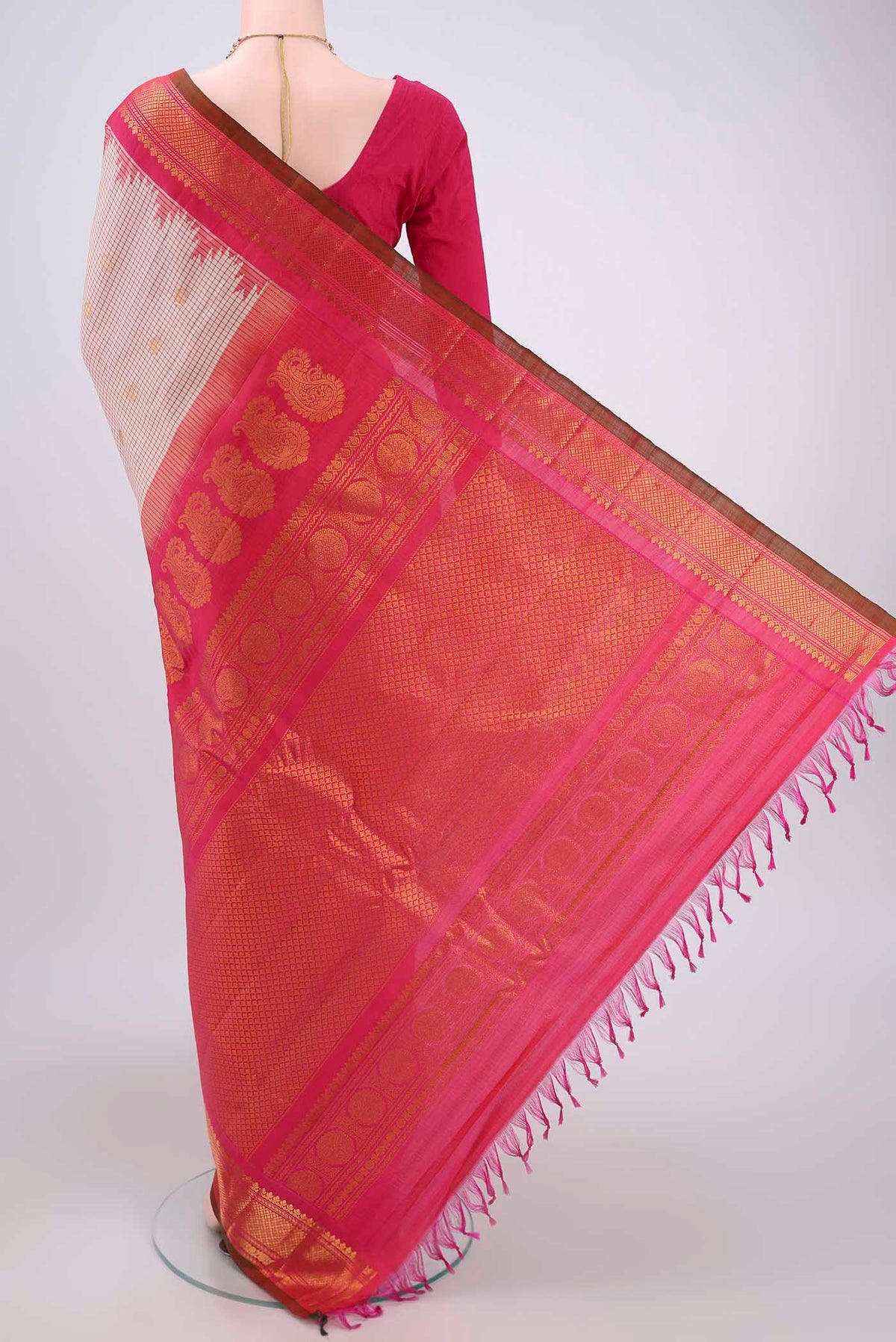 Flat view of Off White Gadwal Silk Saree with Checked design on the body and Zari Border. 
