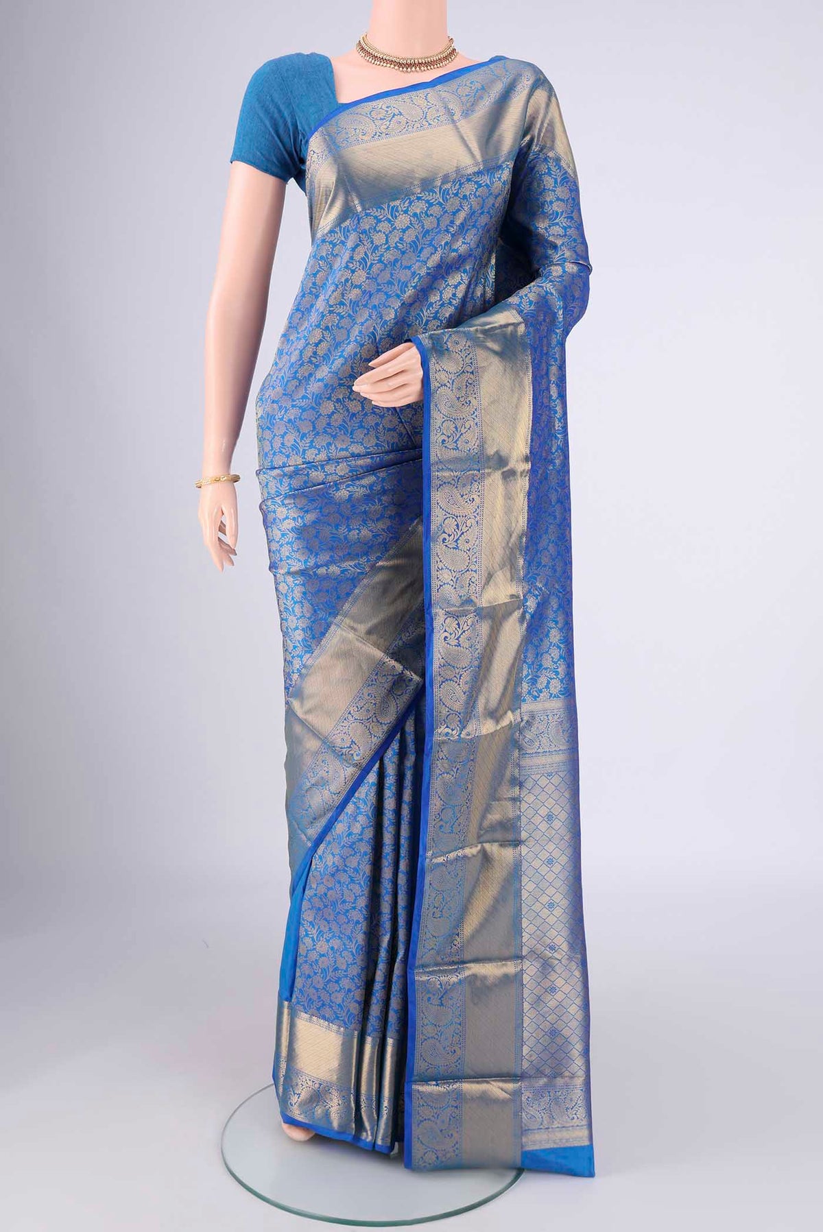 Blue Bangalore Silk Saree with Zari Brocade on the body and Zari Border.  displayed on a mannequin