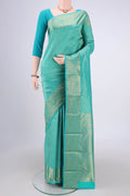 Turquoise Dual Tone Bangalore Silk Saree with Zari Brocade on the body and Zari Border.  displayed on a mannequin