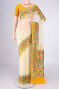 Cream Banarasi Georgette Saree with Zari Butta on the body and Zari Border.  displayed on a mannequin