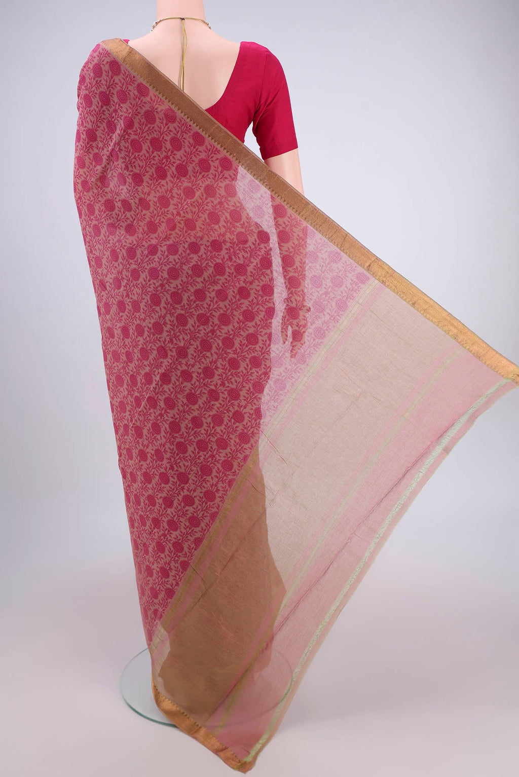 Flat view of Pink Mangalagiri Cotton Saree with Printed design on the body and Zari Border. 