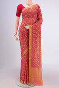 Peach Mangalagiri Cotton Saree with Printed design on the body and Zari Border.  displayed on a mannequin