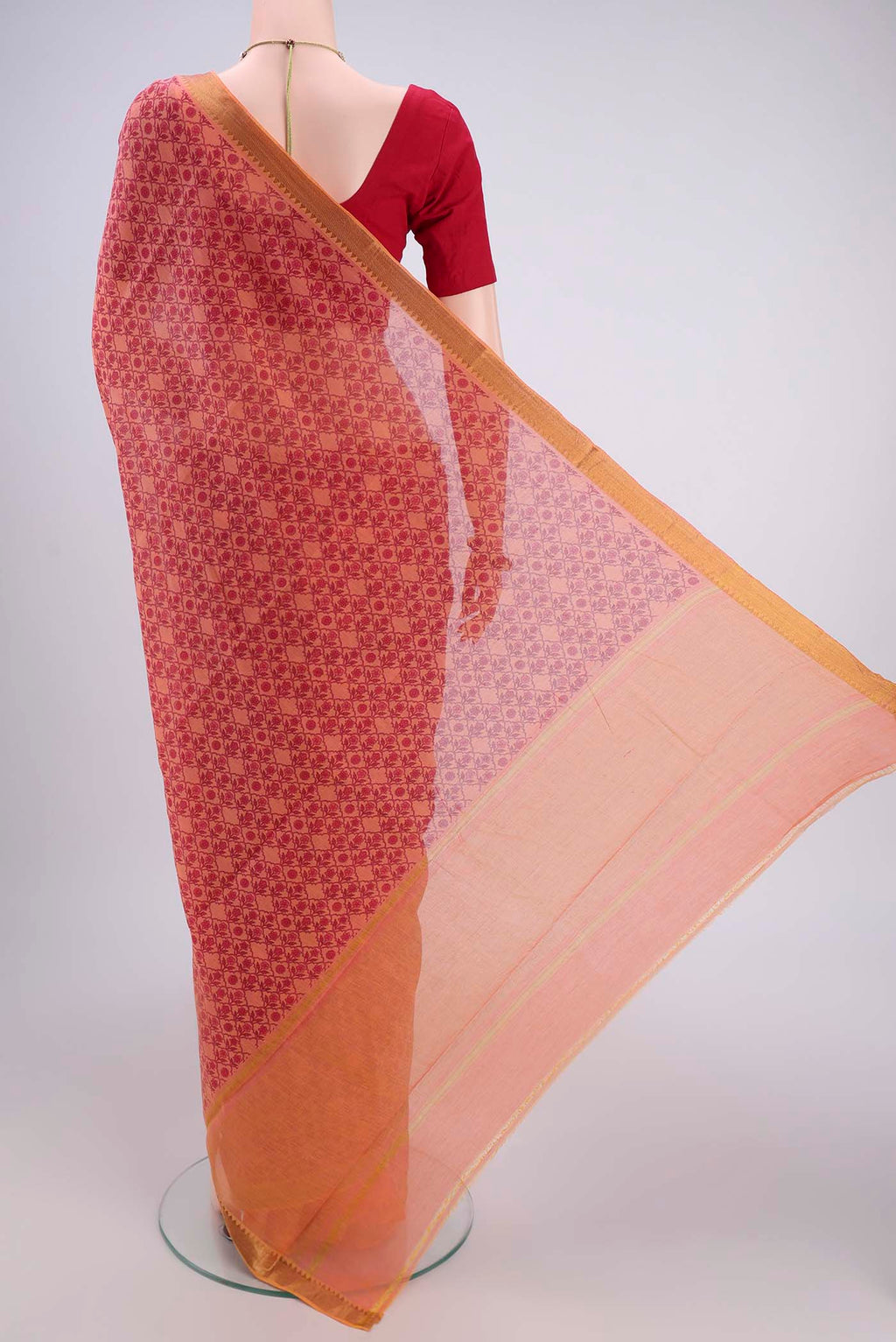 Flat view of Peach Mangalagiri Cotton Saree with Printed design on the body and Zari Border. 