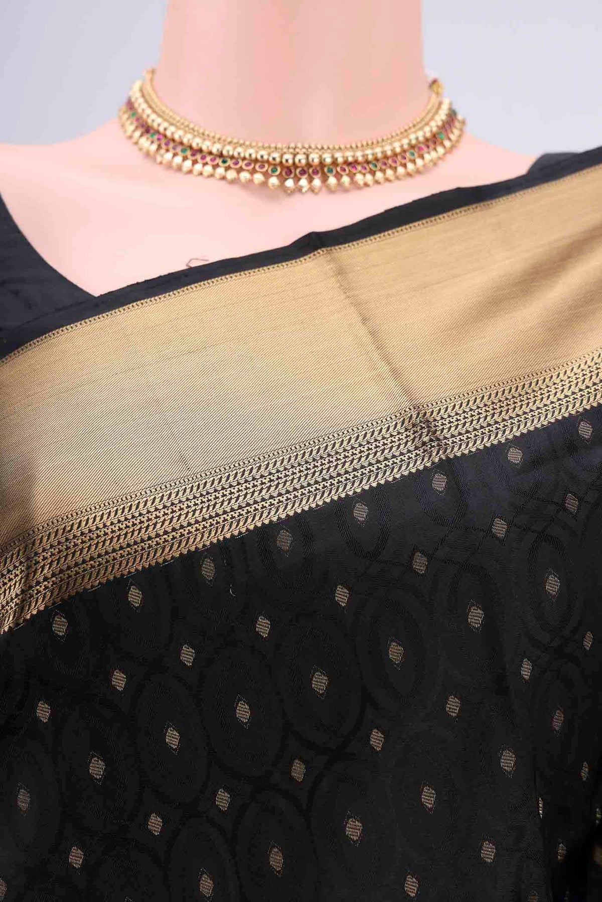 Border image of Black Baluchari Silk Saree with Jacquard With Zari Butta on the body and Zari Border. 