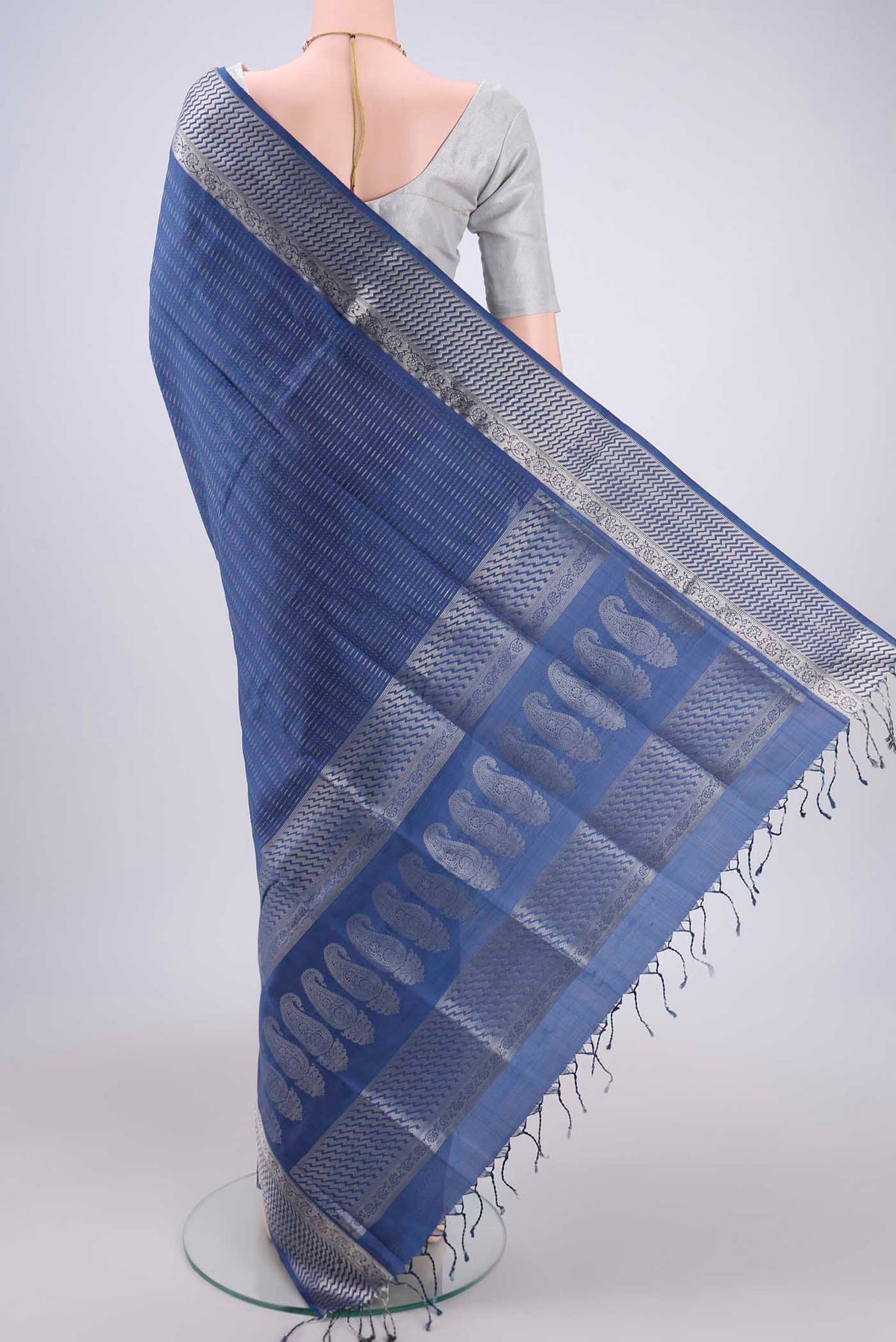 Flat view of Blue Soft Silk Saree with Jacquard design on the body and Zari Border. 