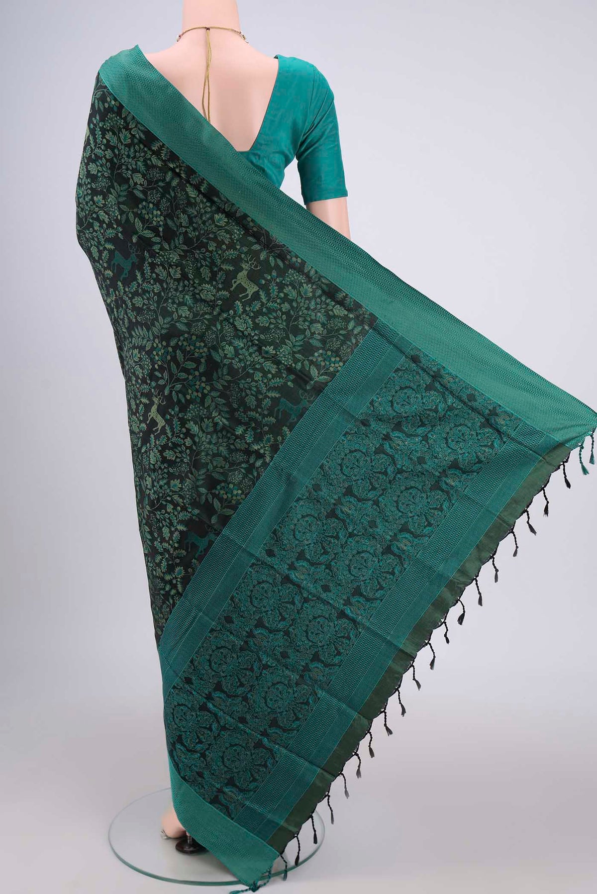 Flat view of Olive Green Dual Tone Baluchari Silk Saree with Jacquard design on the body and Zari Border. 