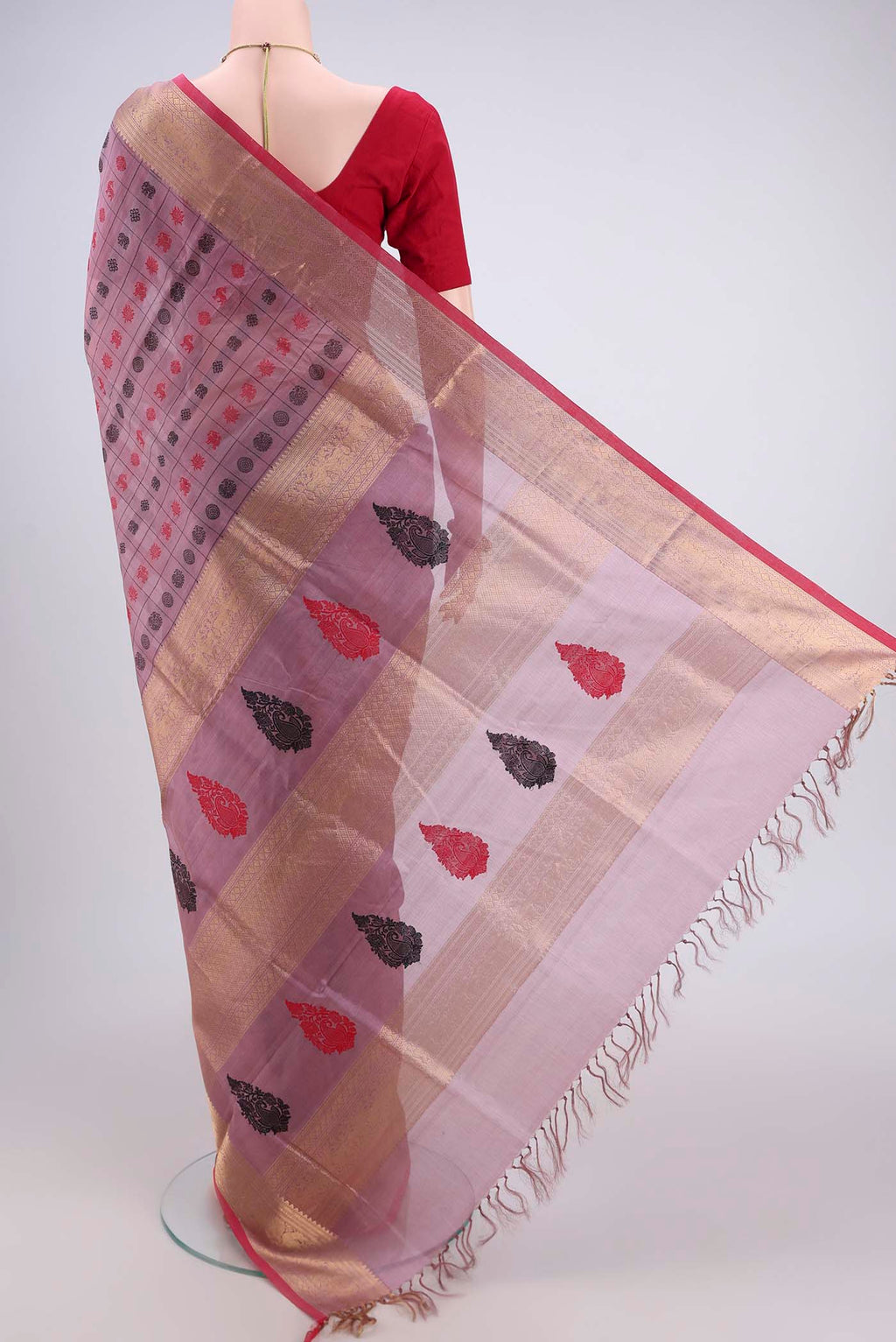Flat view of Lavender Coimbatore Silk Cotton Saree with Checked design on the body and Zari Border. 