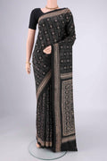 Black Kantha Silk Saree with Kantha Work on the body and Thread Border.  displayed on a mannequin