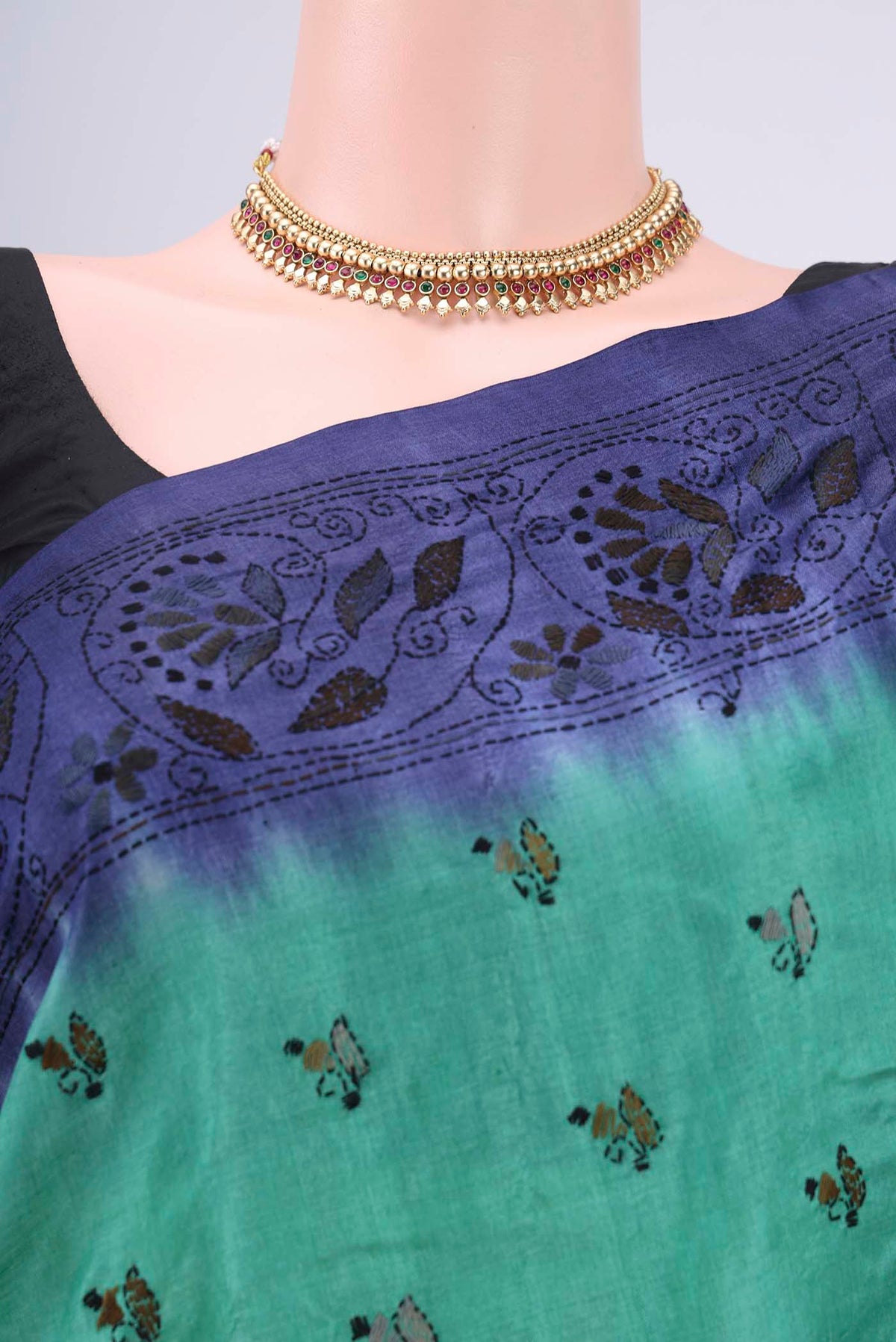 Border image of Sea Green Kantha Silk Saree with Kantha Work on the body and Thread Border. 