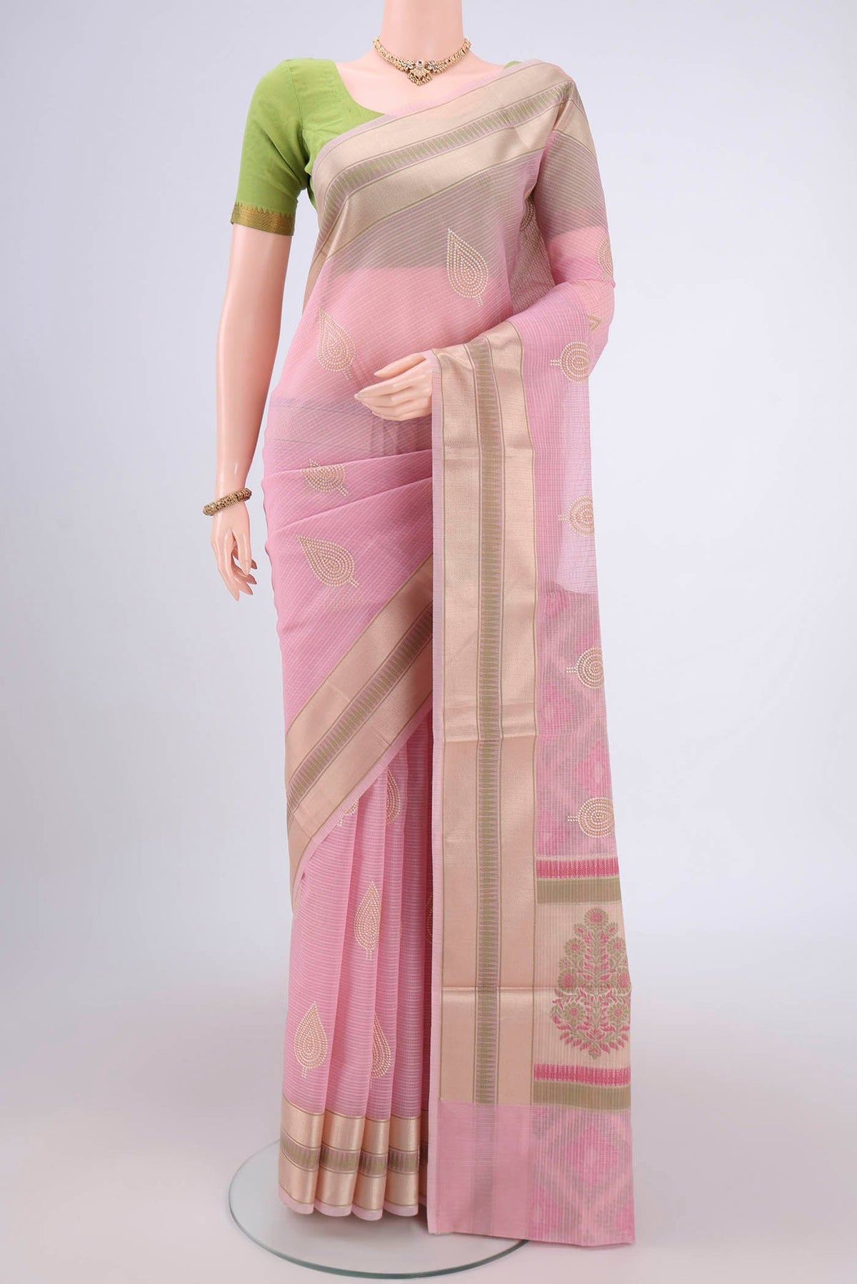 Rose pink Blended Kota Cotton Saree with Embroidery on the body and Zari Border.  displayed on a mannequin