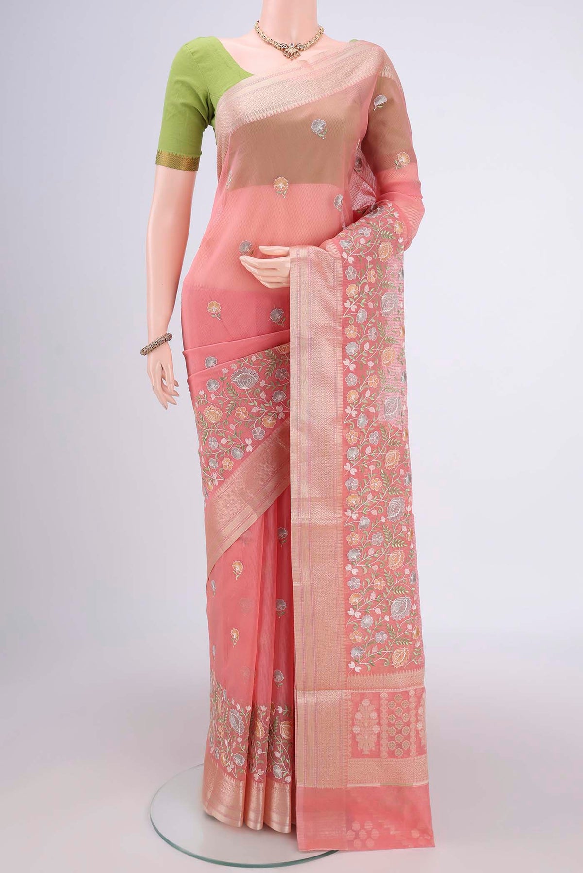 Pink Blended Kota Cotton Saree with Embroidery on the body and Zari Border.  displayed on a mannequin