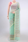 Mint Green Blended Kota Cotton Saree with Embroidery on the body and Zari Border.  displayed on a mannequin