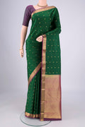 Purple Kanjivaram Silk Saree with Zari Butta on the body and Zari Border.  displayed on a mannequin
