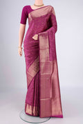 Magenta Soft Silk Saree with Zari Brocade on the body and Zari Border.  displayed on a mannequin