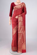 Maroon Soft Silk Saree with Zari Brocade on the body and Zari Border.  displayed on a mannequin