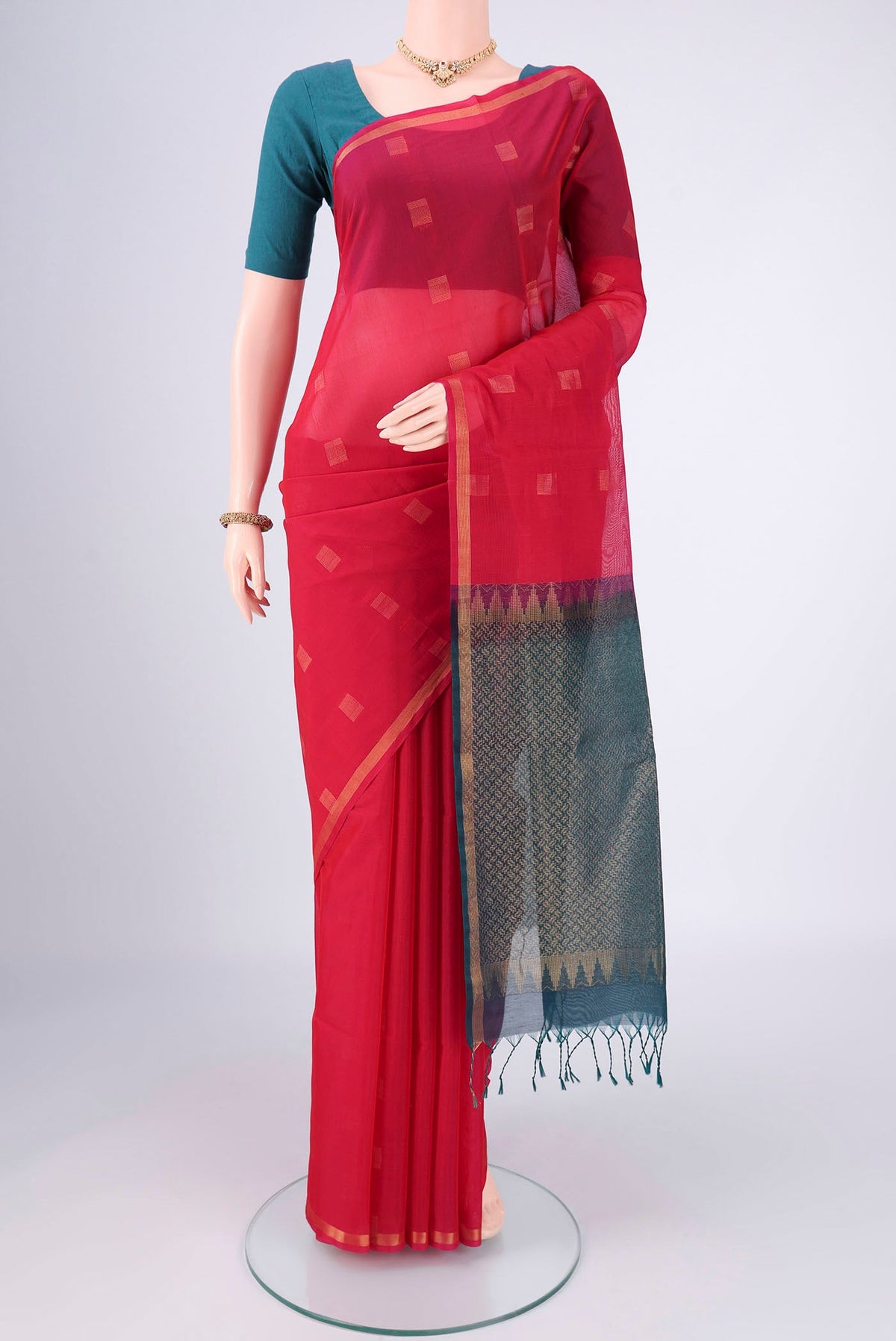 Red Kora Cotton Saree with Zari Butta on the body and Plain Border.  displayed on a mannequin