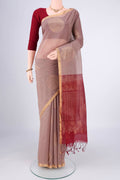 Dark Beige Kora Cotton Saree with Zari Butta on the body and Plain Border.  displayed on a mannequin