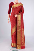 Pure Silk Pure Zari Red Kanjivaram Saree with Zari Brocade on the body and Zari Border.  displayed on a mannequin