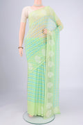 Light Green Mysore Chiffon Saree with Checked design on the body and Thread Border.  displayed on a mannequin