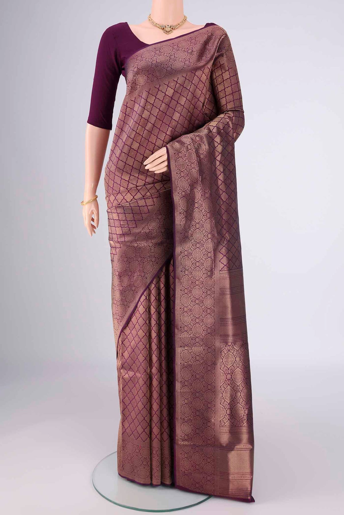 Purple Soft Silk Saree with Zari Brocade on the body and Zari Border.  displayed on a mannequin