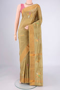Beige Uppada Silk Saree with Zari And Thread Butta on the body and Zari Border.  displayed on a mannequin