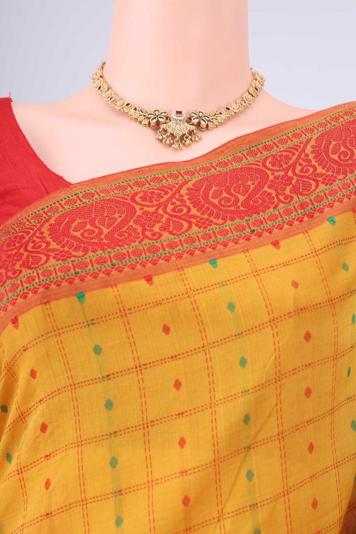 Border image of Yellow Blended Poly Cotton Saree with Checked design on the body and Thread Border. 