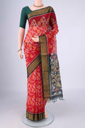 Red Silk Cotton Saree with Ikat design on the body and Zari Border.  displayed on a mannequin