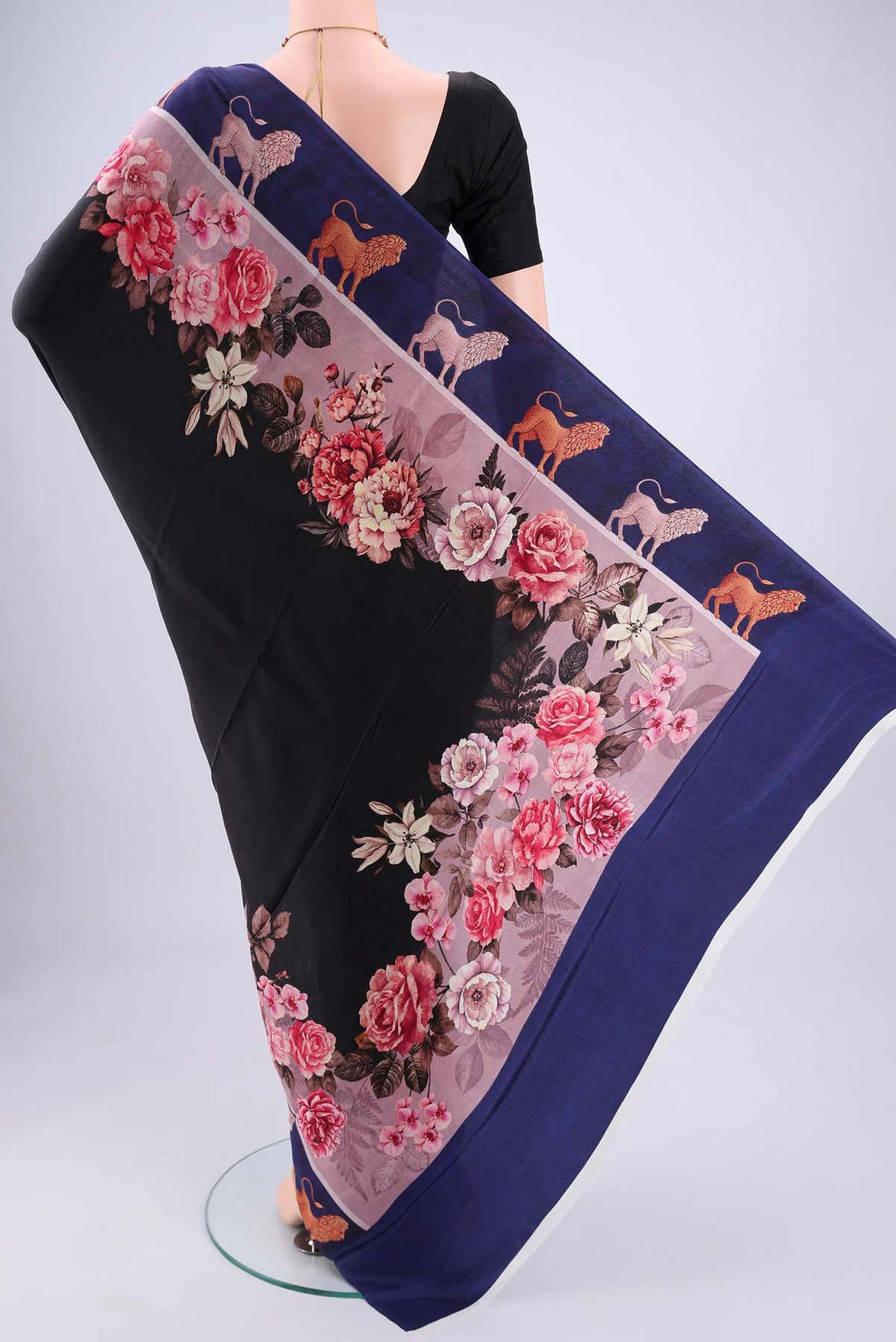 Flat view of Black Mysore Crepe Saree with Floral Print on the body and Zari Border. 
