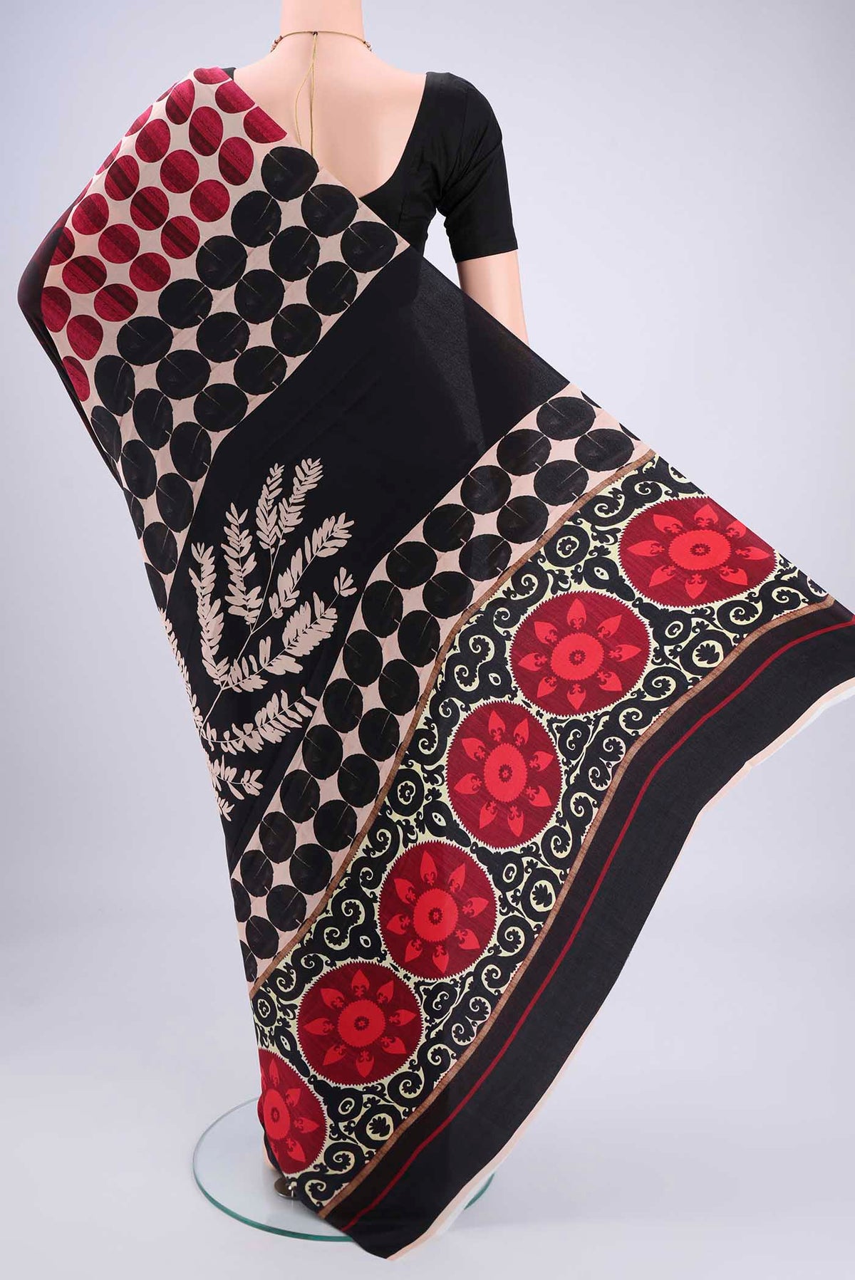 Flat view of Black Mysore Crepe Saree with Floral Print on the body and Zari Border. 
