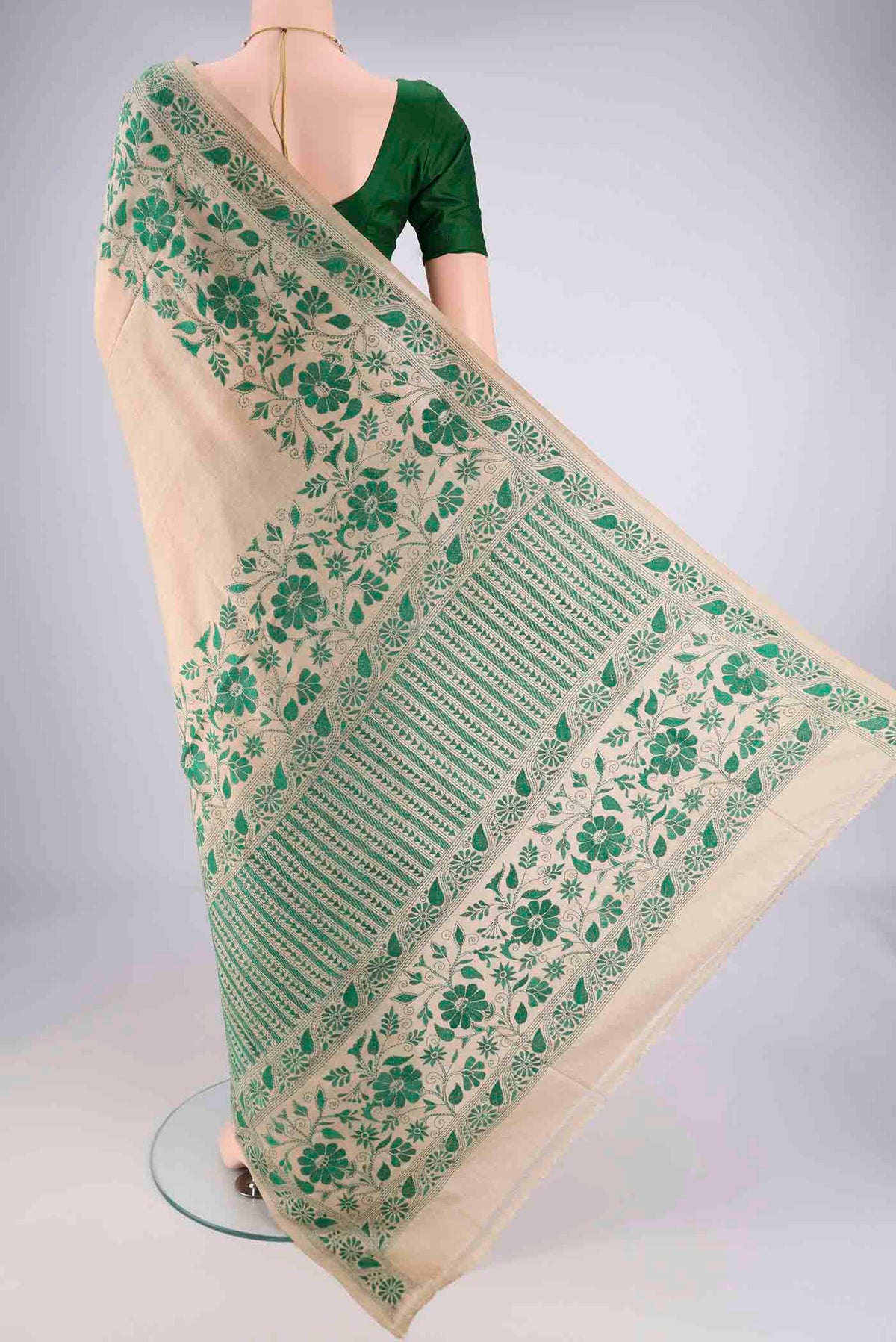 Flat view of Beige Tussar Silk Saree with Kantha Work on the body and Thread Border. 