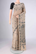 Beige Tussar Silk Saree with Kantha Work on the body and Thread Border.  displayed on a mannequin