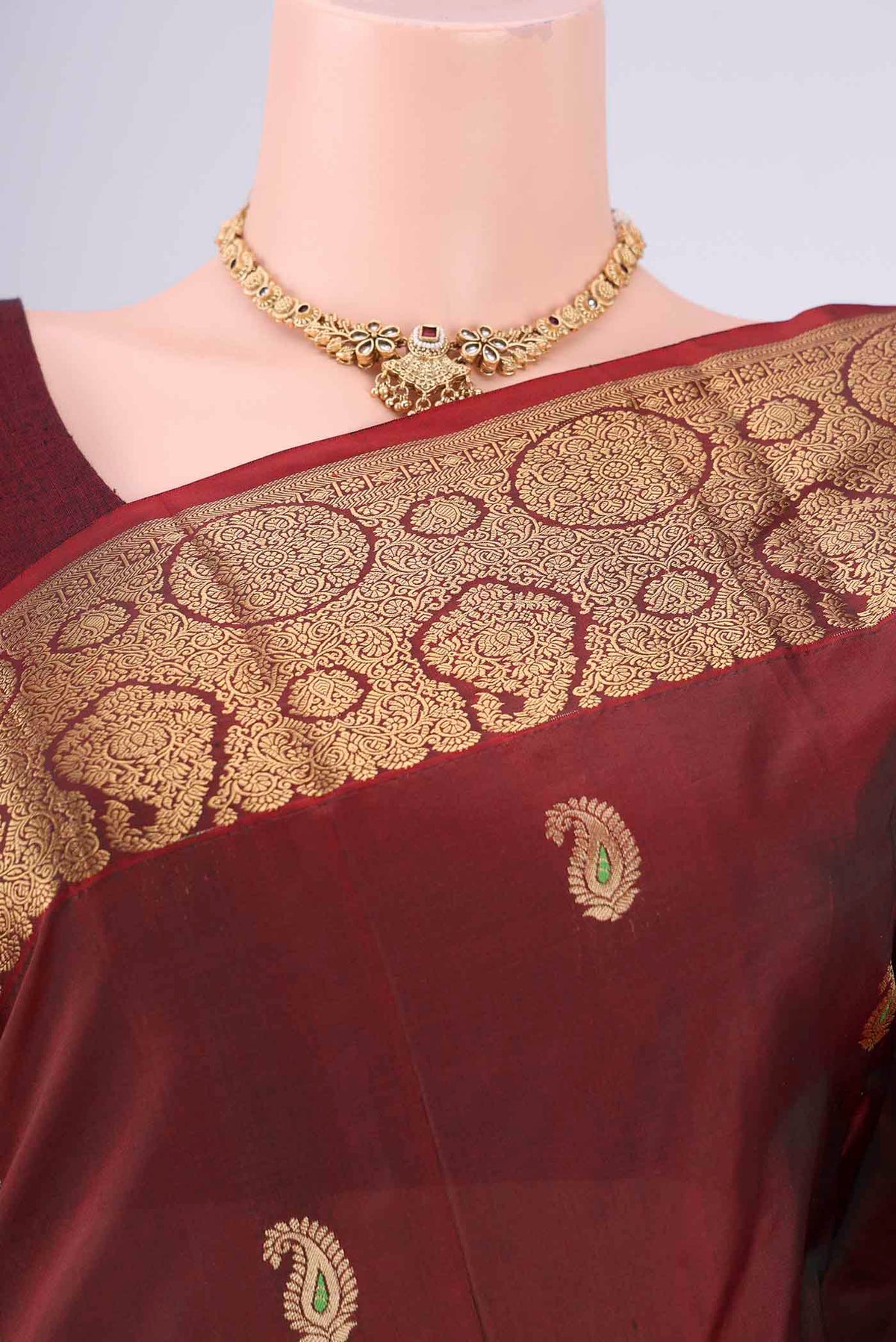 Border image of Maroon Dual Tone Blended Bangalore Silk Saree with Zari Butta on the body and Zari Border. 