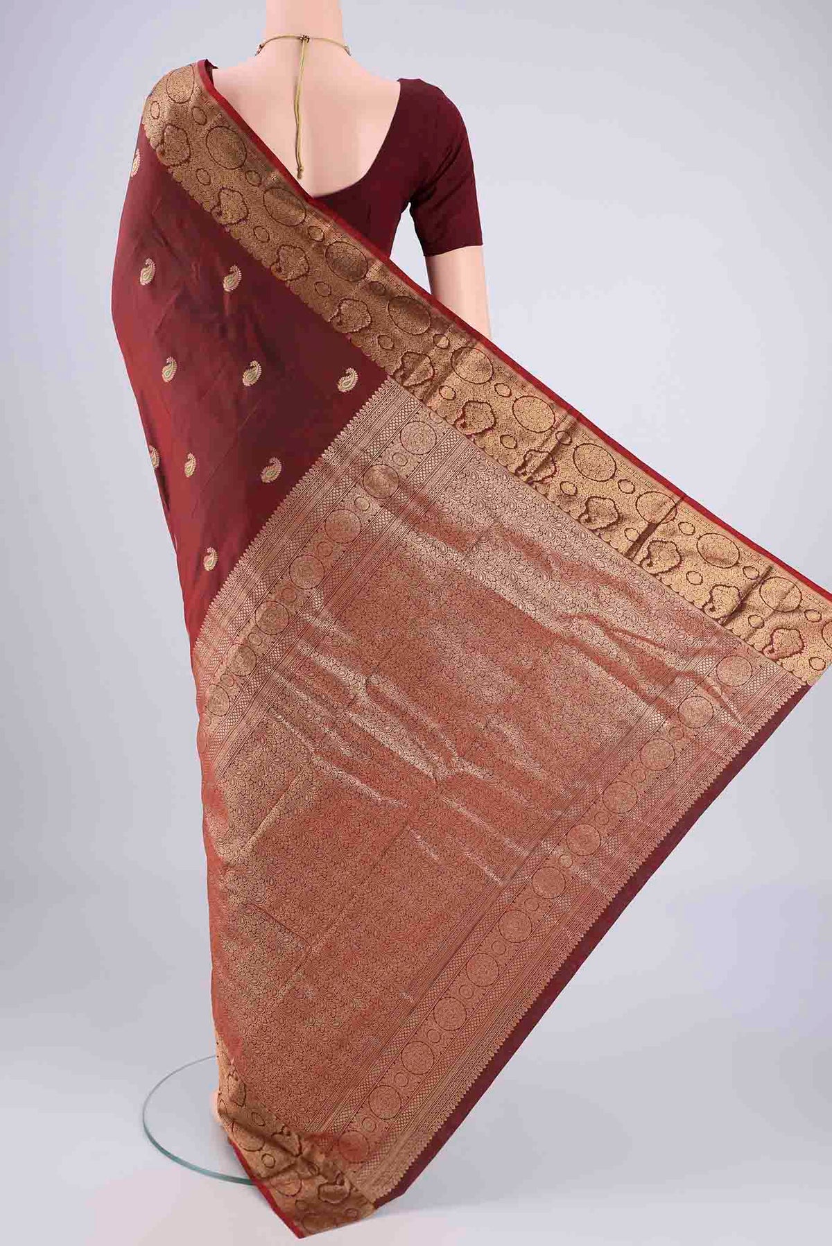 Flat view of Maroon Dual Tone Blended Bangalore Silk Saree with Zari Butta on the body and Zari Border. 