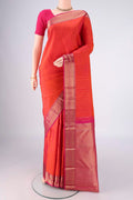 Orange Kanchipuram Silk Saree with Zari Butta on the body and Zari Border.  displayed on a mannequin