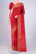 Red Pochampally Silk Saree with Ikat design on the body and Zari Border.  displayed on a mannequin