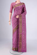 Purple Pochampally Silk Saree with Ikat design on the body and Zari Border.  displayed on a mannequin