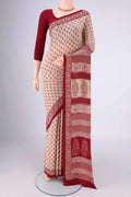 Beige Mysore Crepe Saree with Printed design on the body and Printed Border.  displayed on a mannequin
