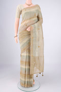 Sage Green Linen Saree with Embroidery on the body and Lace Border.  displayed on a mannequin