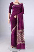 Purple Banarasi Silk Saree with Thread Butta on the body and Thread Border.  displayed on a mannequin