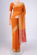 Mustard Silk Cotton Saree with Zari Butta on the body and Zari Border.  displayed on a mannequin