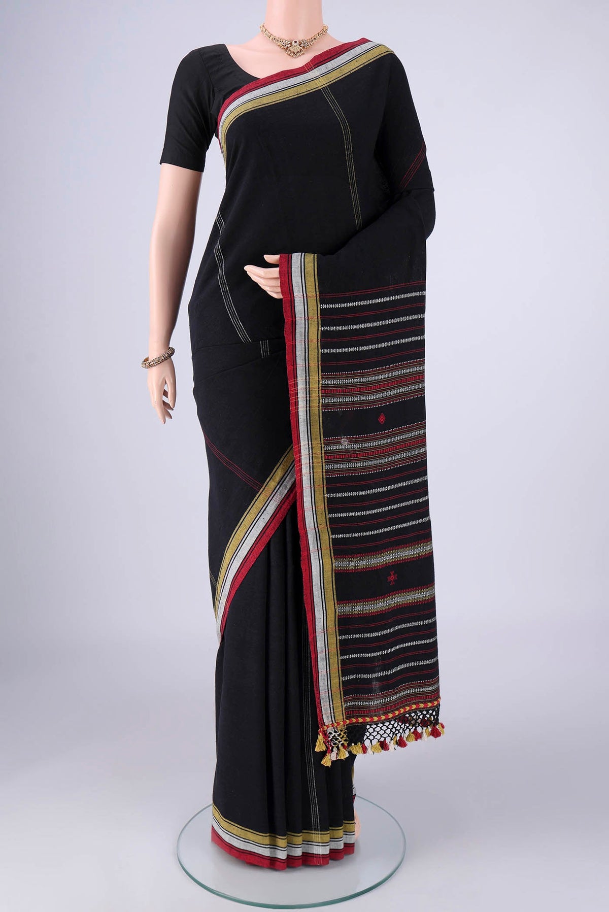 Gold with Red Dual Tone Khadi Cotton Saree with Stripes on the body and Plain Border.  displayed on a mannequin