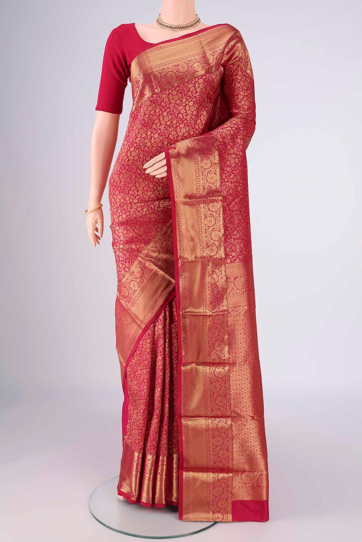 Dark Pink Bangalore Silk Saree with Zari Brocade on the body and Zari Border.  displayed on a mannequin