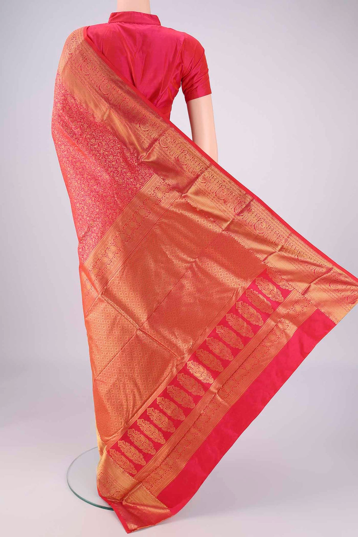 Flat view of Dark Pink Bangalore Silk Saree with Zari Brocade on the body and Zari Border. 