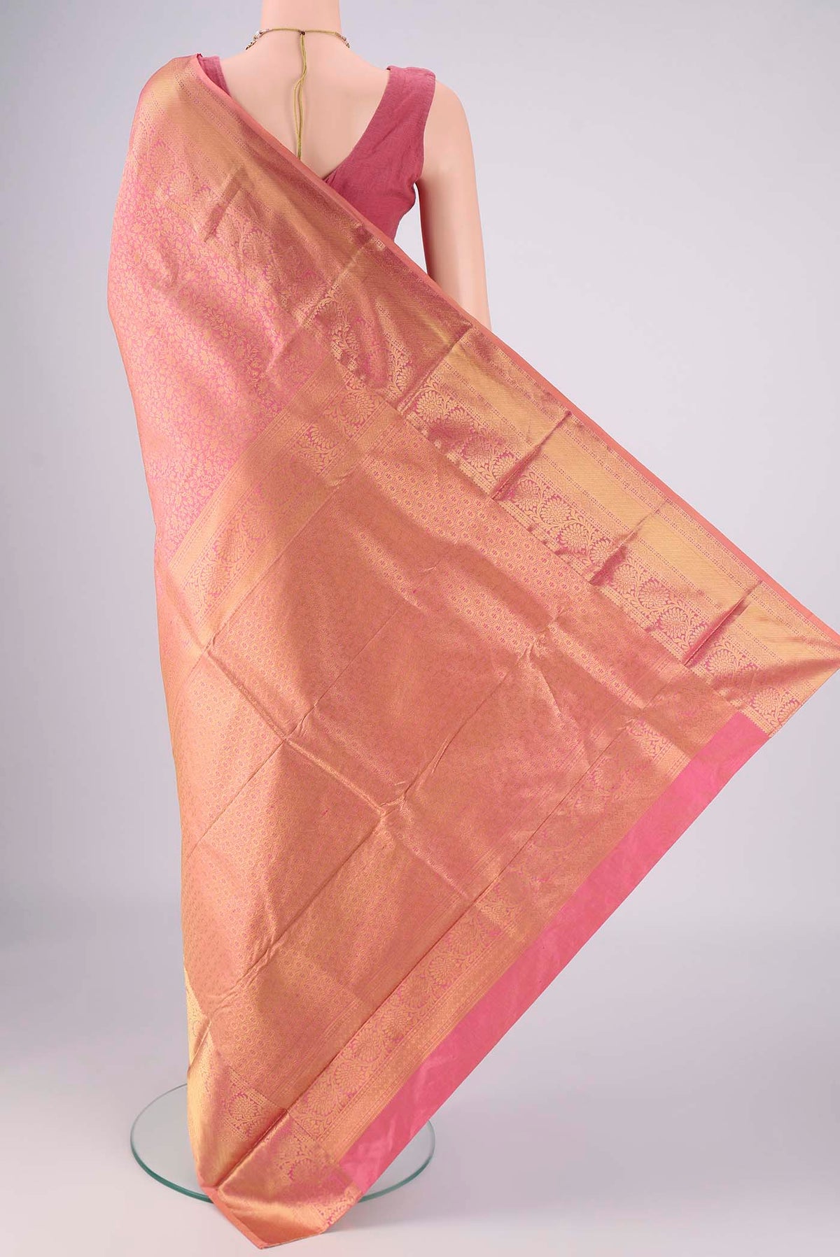 Flat view of Rose Gold Bangalore Silk Saree with Zari Brocade on the body and Zari Border. 