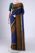 Dark Blue Kanchipuram Silk Saree with Zari Butta on the body and Zari Border.  displayed on a mannequin
